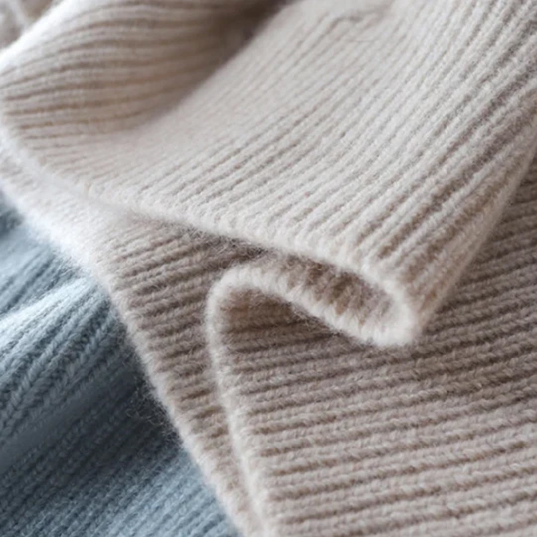 Comfortabele coltrui van wol met elegante details – Dames