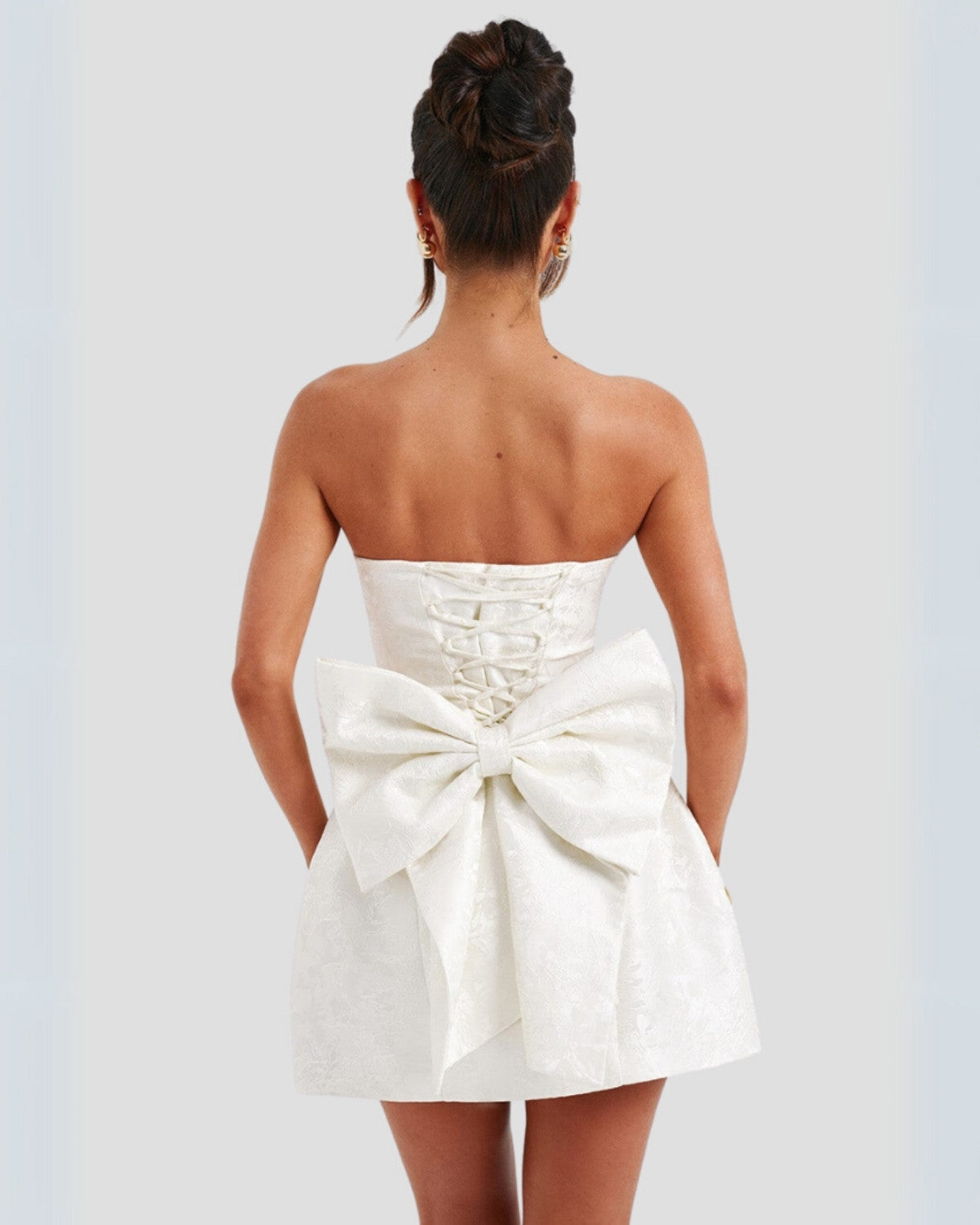 Elegante mini zomerjurk met strik op de rug - Dames