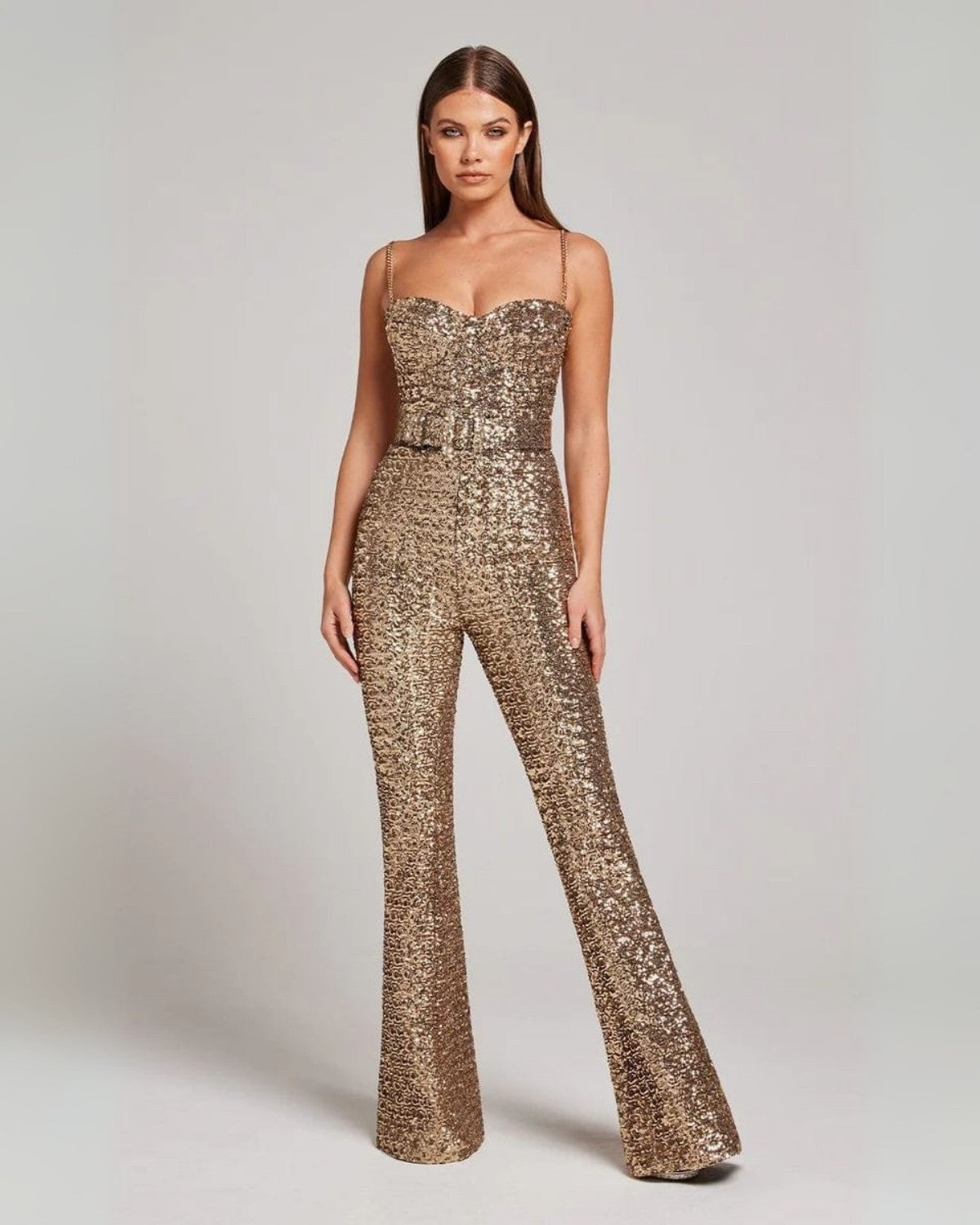Glinsterende jumpsuit met taille riem van rekbare stof – Dames