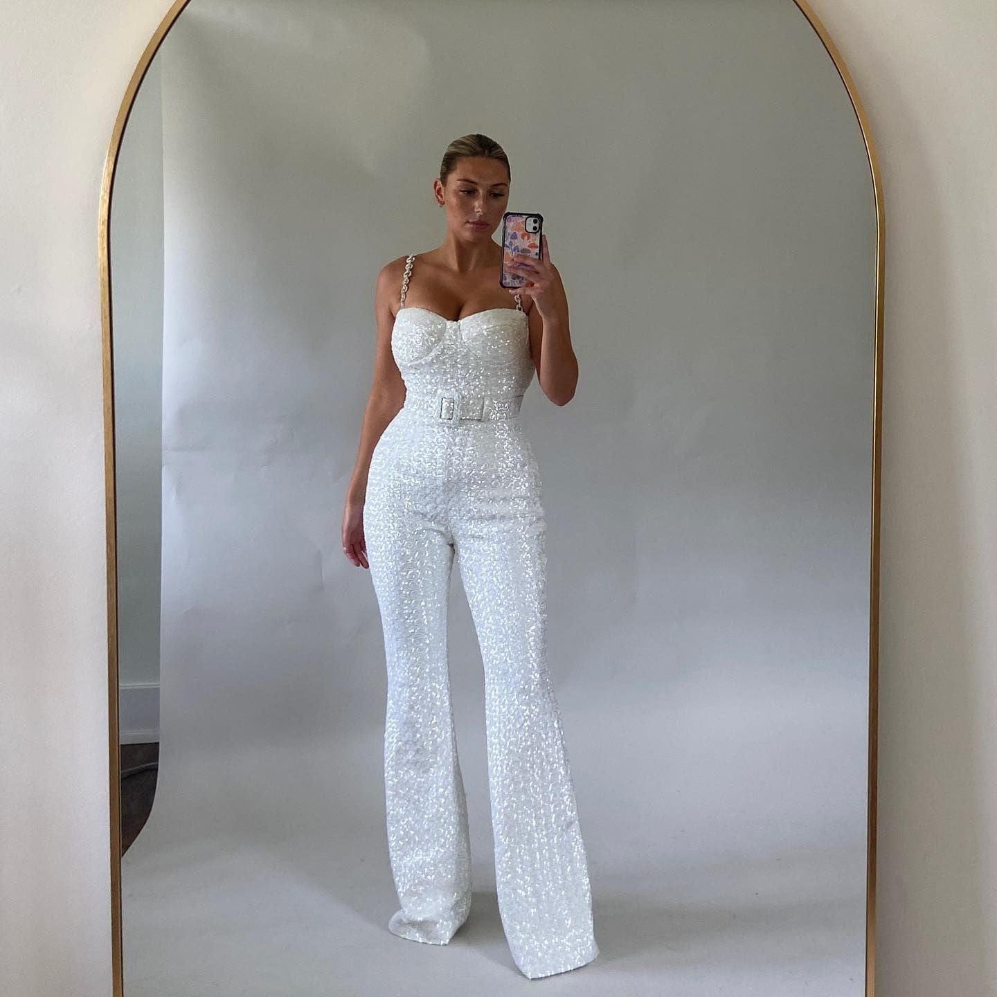 Glinsterende jumpsuit met taille riem van rekbare stof – Dames