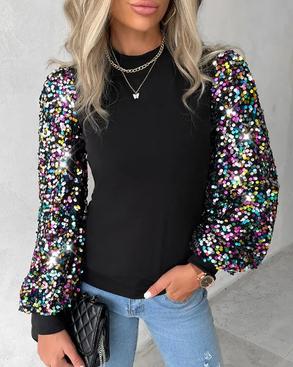 Chique top met kleurrijke ballonmouwen en pailletten details – Dames