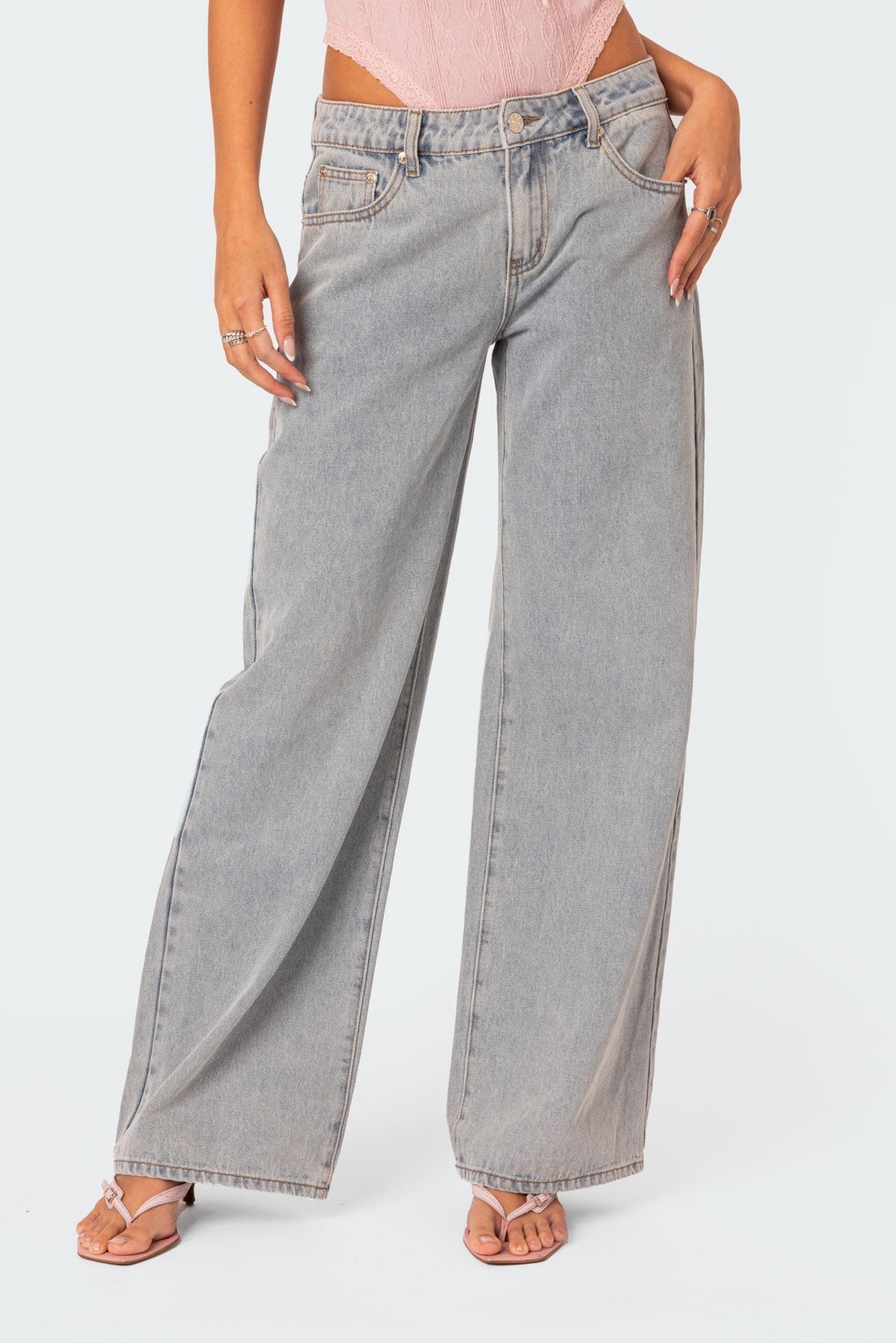 Stijlvolle denim jeans met wijde pijpen en roze strikdetails - Dames