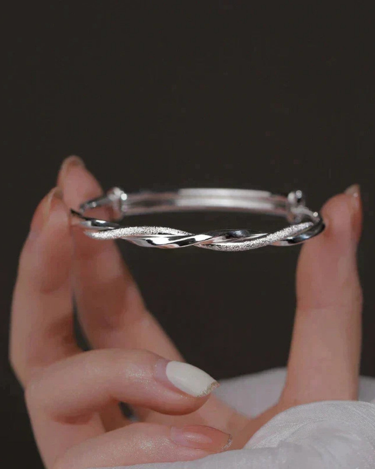 Elegante gedraaide zilveren armband - Dames