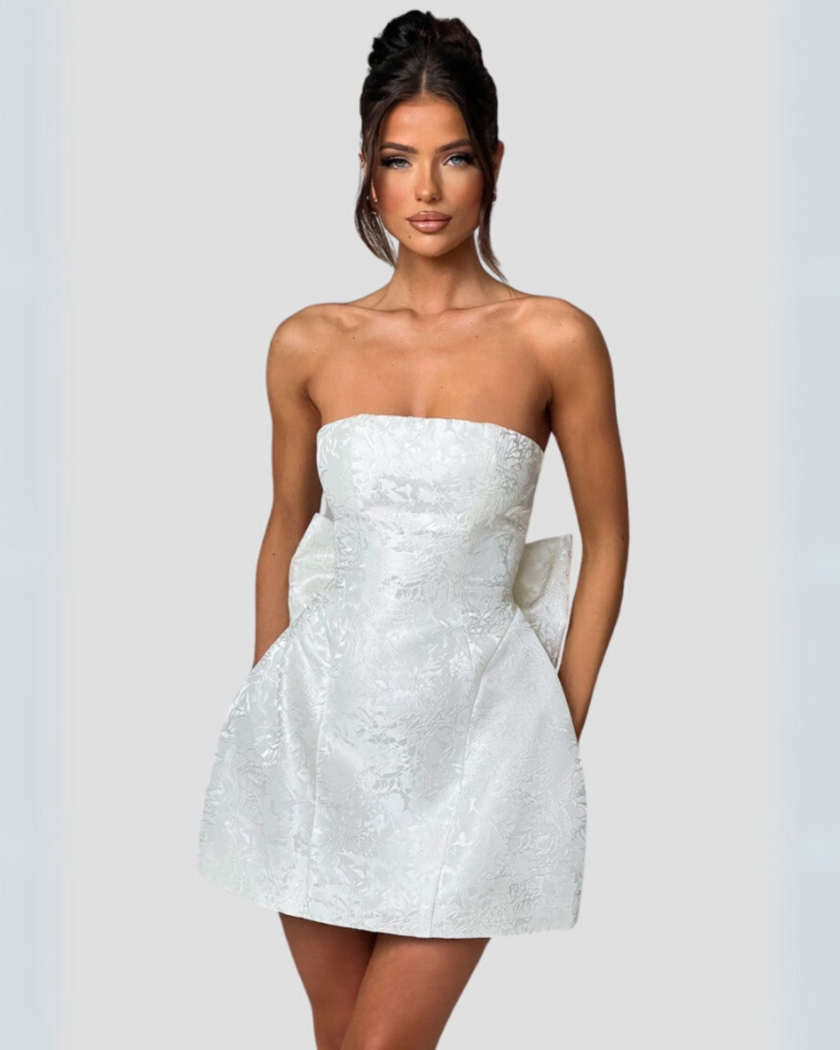 Elegante mini zomerjurk met strik op de rug - Dames