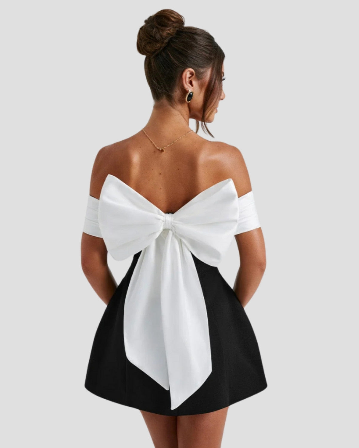 Elegante zwart-witte mini strik jurk - Dames