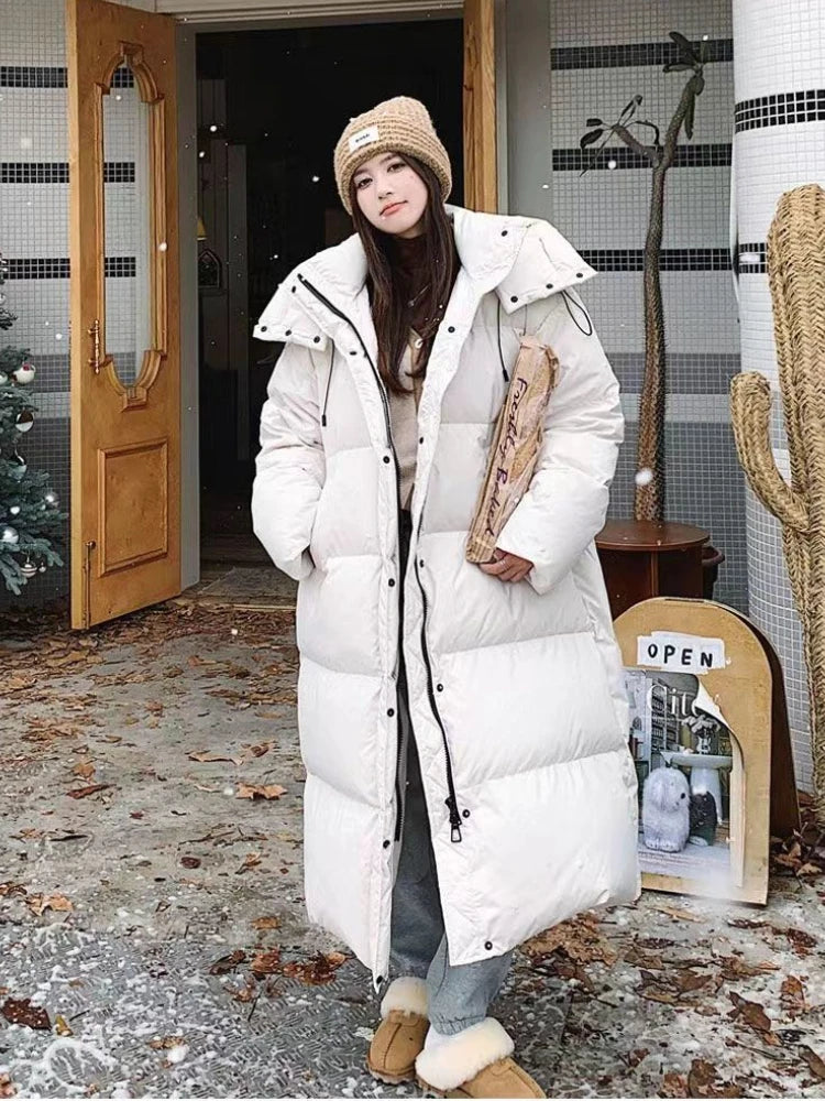Comfortabele lange gewatteerde puffer jas met capuchon – Dames