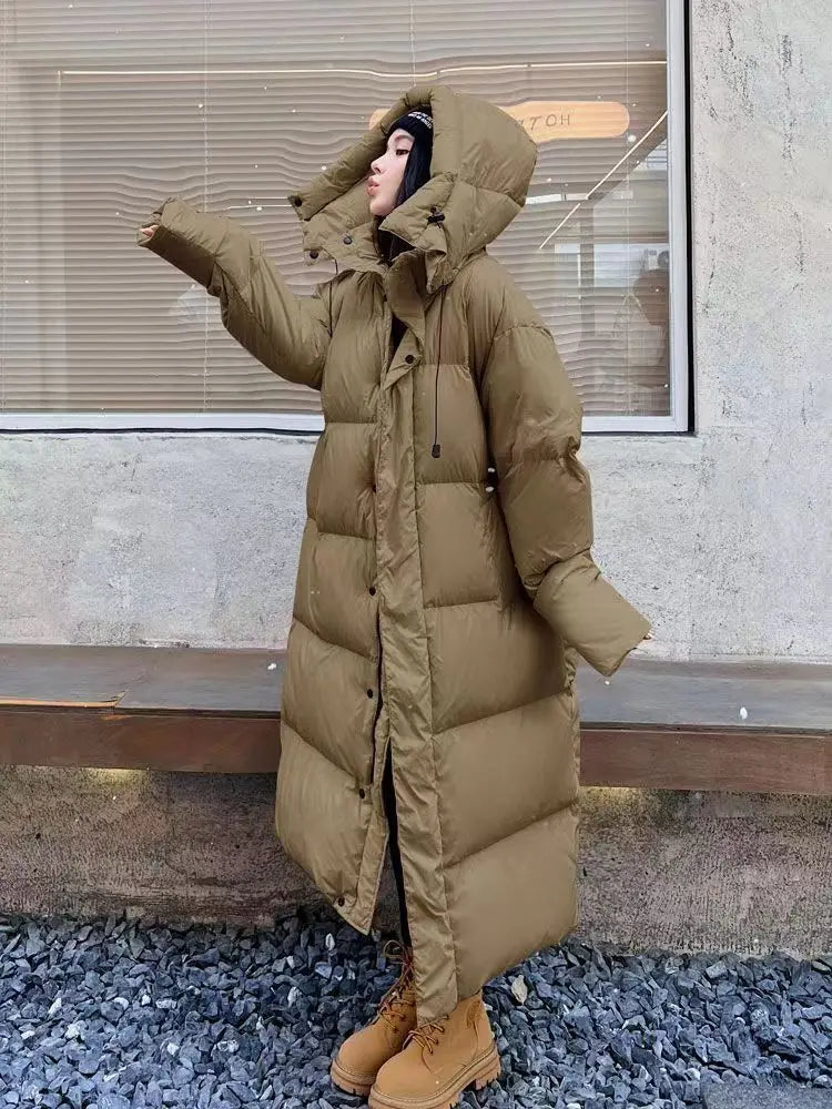 Comfortabele lange gewatteerde puffer jas met capuchon – Dames