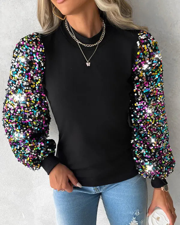 Chique top met kleurrijke ballonmouwen en pailletten details – Dames