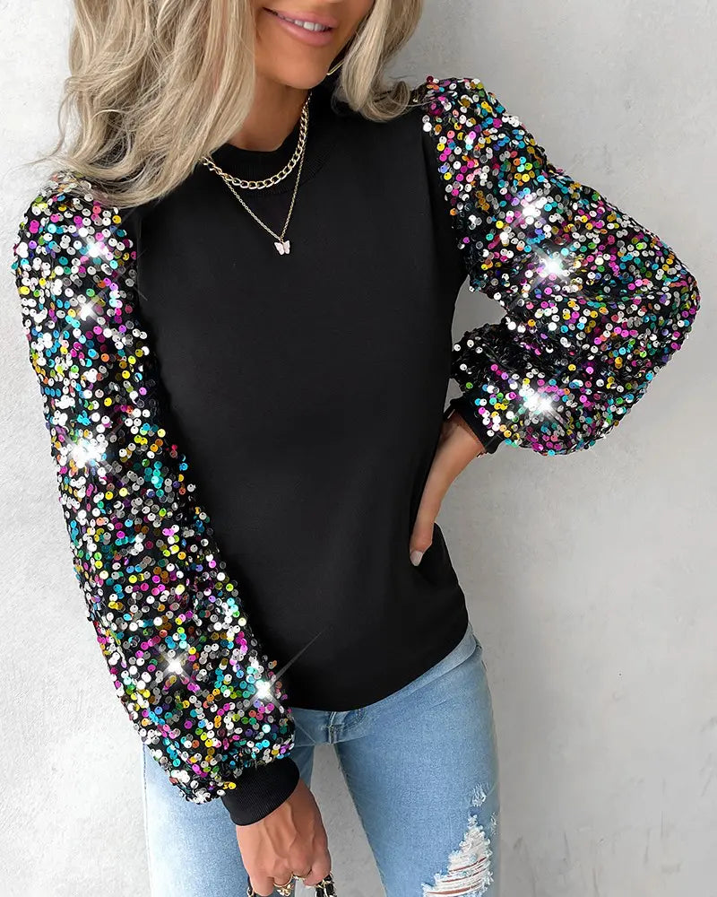 Chique top met kleurrijke ballonmouwen en pailletten details – Dames
